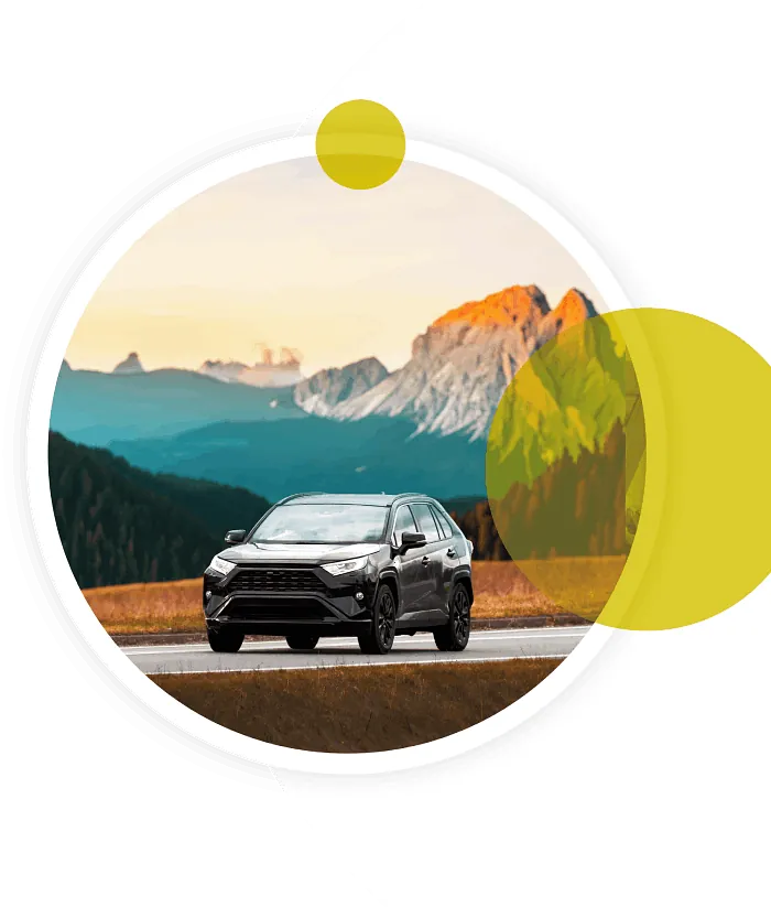 voiture sur fond de montagne